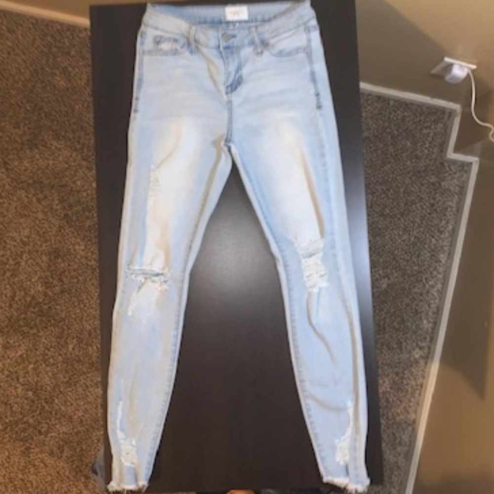 Mid Rise Ankle Skinny Ripped Jeans